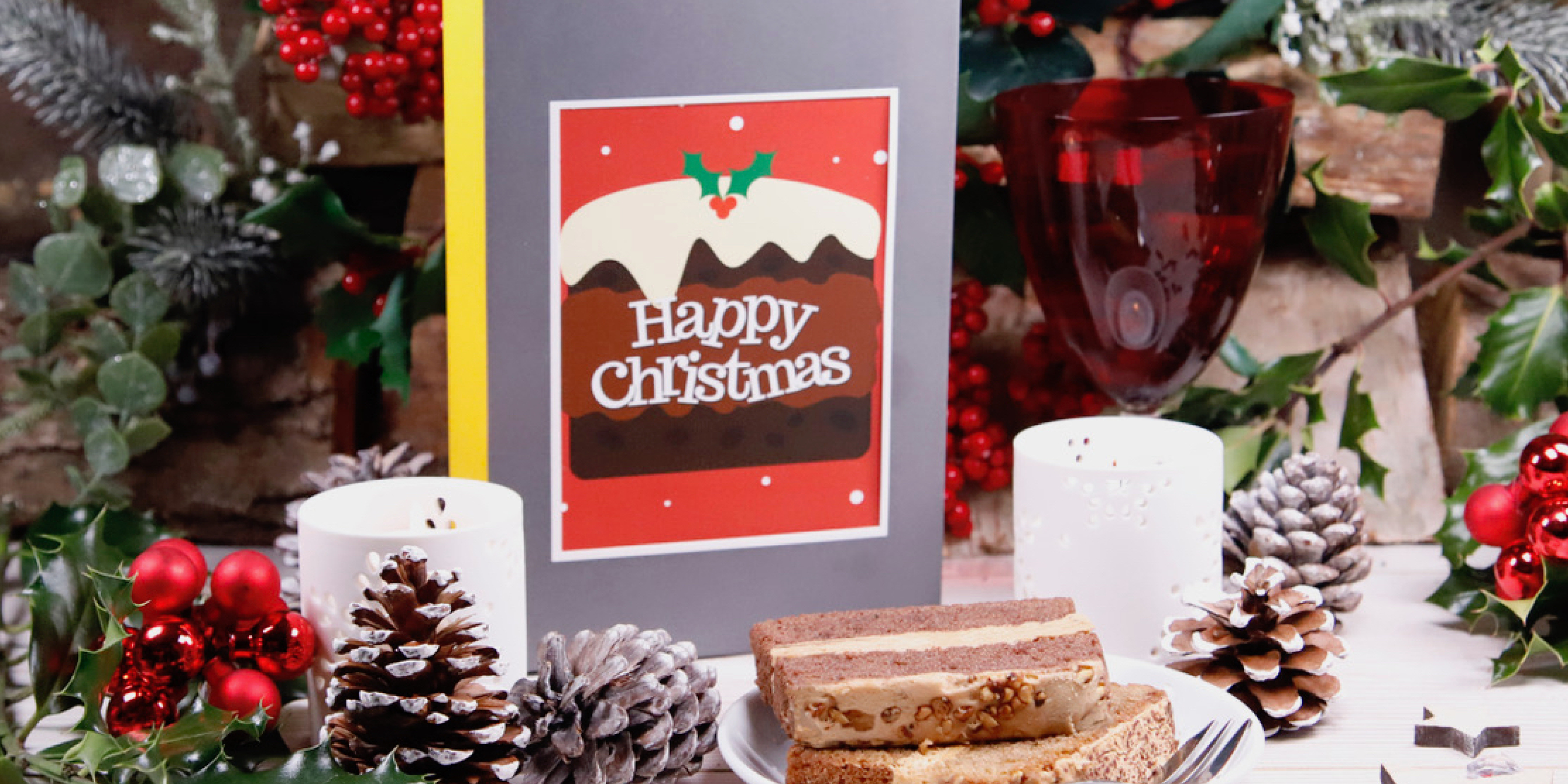 M&S Iced Fruit Cake Christmas Cake with Father Christmas Santa Claus card  set on white background - UK festive Xmas Stock Photo - Alamy