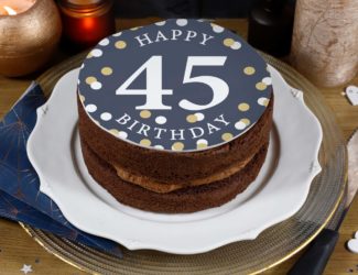 Number Cakes - Blog Thumbnail - Chocolate cake with Happy 45th Birthday on it