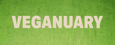 green textured background with the word 'veganuary' overlaid