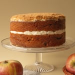 Gluten Free Apple Crumble - Wedge cut out in front of cake - side view